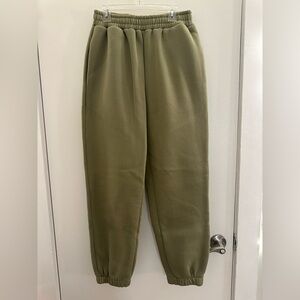 Green sweatpants